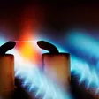 Elektrische Zündung der Flamme in einer Gastherme.