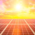 Photovoltaic solar panels on sunset sky background,green clean energy concept.