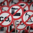 Fossil power generation banned. CO2 carbon dioxide neutrality and green deal concept. 3D rendered illustration.