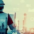 Future factory plant and inventive energy industry concept in creative graphic design. Oil, gas and petrochemical refinery factory with hologram showing next generation of power and energy business.