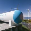 Hydrogen renewable energy production - hydrogen gas for clean electricity solar and windturbine facility. 3d rendering.