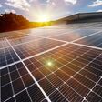 Solar panels on factory roof photovoltaic solar panels absorb sunlight as a source of energy to generate electricity creating sustainable energy.