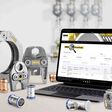Presswerkzeuge und Laptop mit Online-Seite zum REMS PressFinder