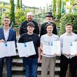 Rauchfangkehrer Innungsmeister Wien Michael Gerhard Cesnek, Bundesinnungsmeister Plesar Christian. Vordere Reihe v.l. Eric Fanselow, Lukas Röhrer, Florian Essl, Tobias Höfler