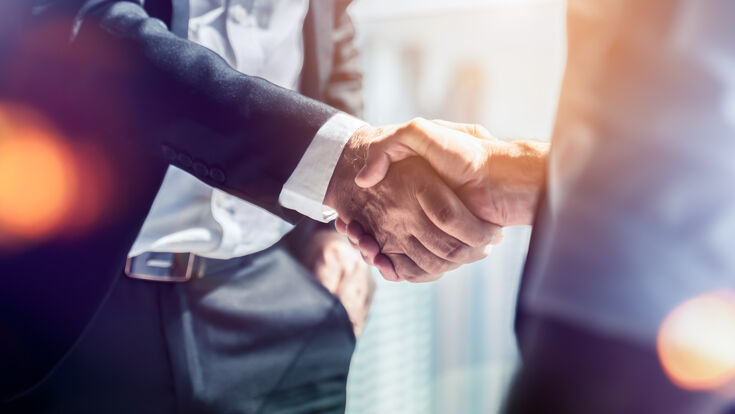© Adobe Stock handshake deal partnership teamwork acquisition merger businessman agreements cooperation success friendship greeting lawyer business company respect suit meeting appreciate shake hand power strategy communication future job support finance leader person client executive corporate bank people contract union businessperson work professional together background male commerce economy team office career happy